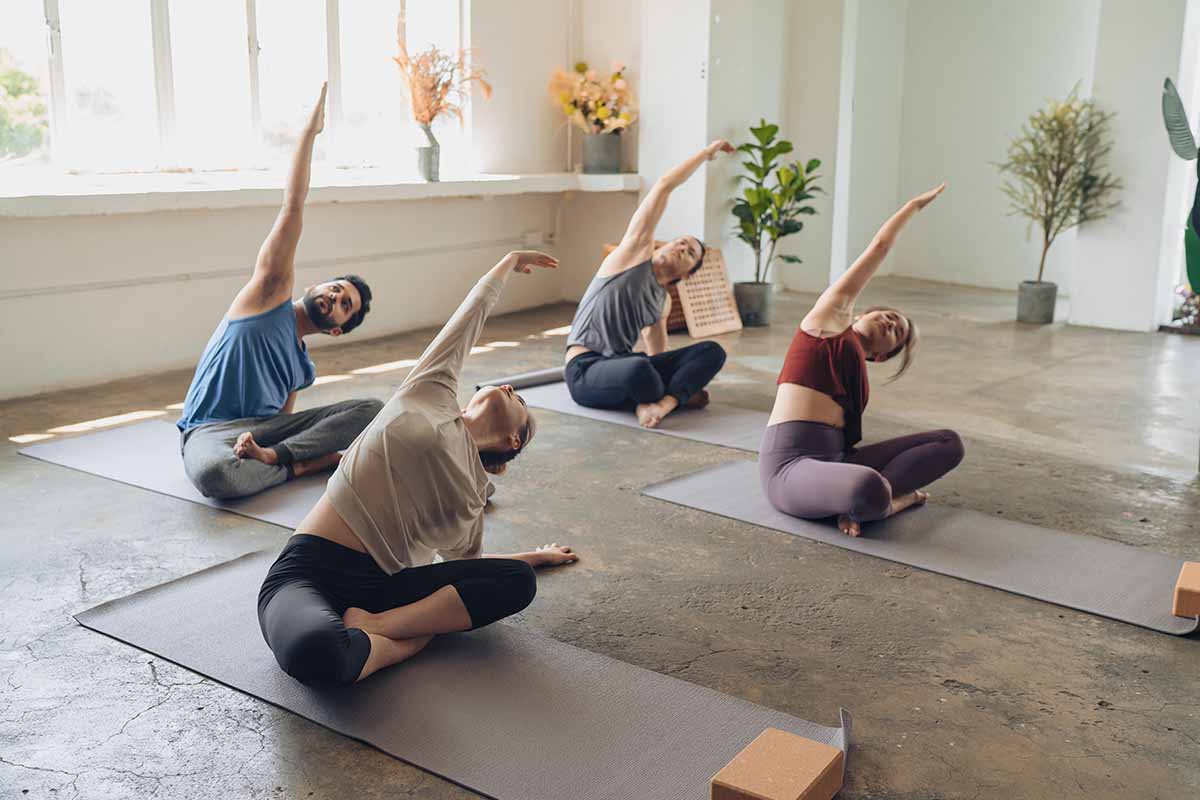 People doing yoga and feeling fit after taking GLP-1 in Golden.